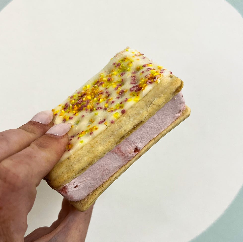 hand holding pop tart ice cream sandwich