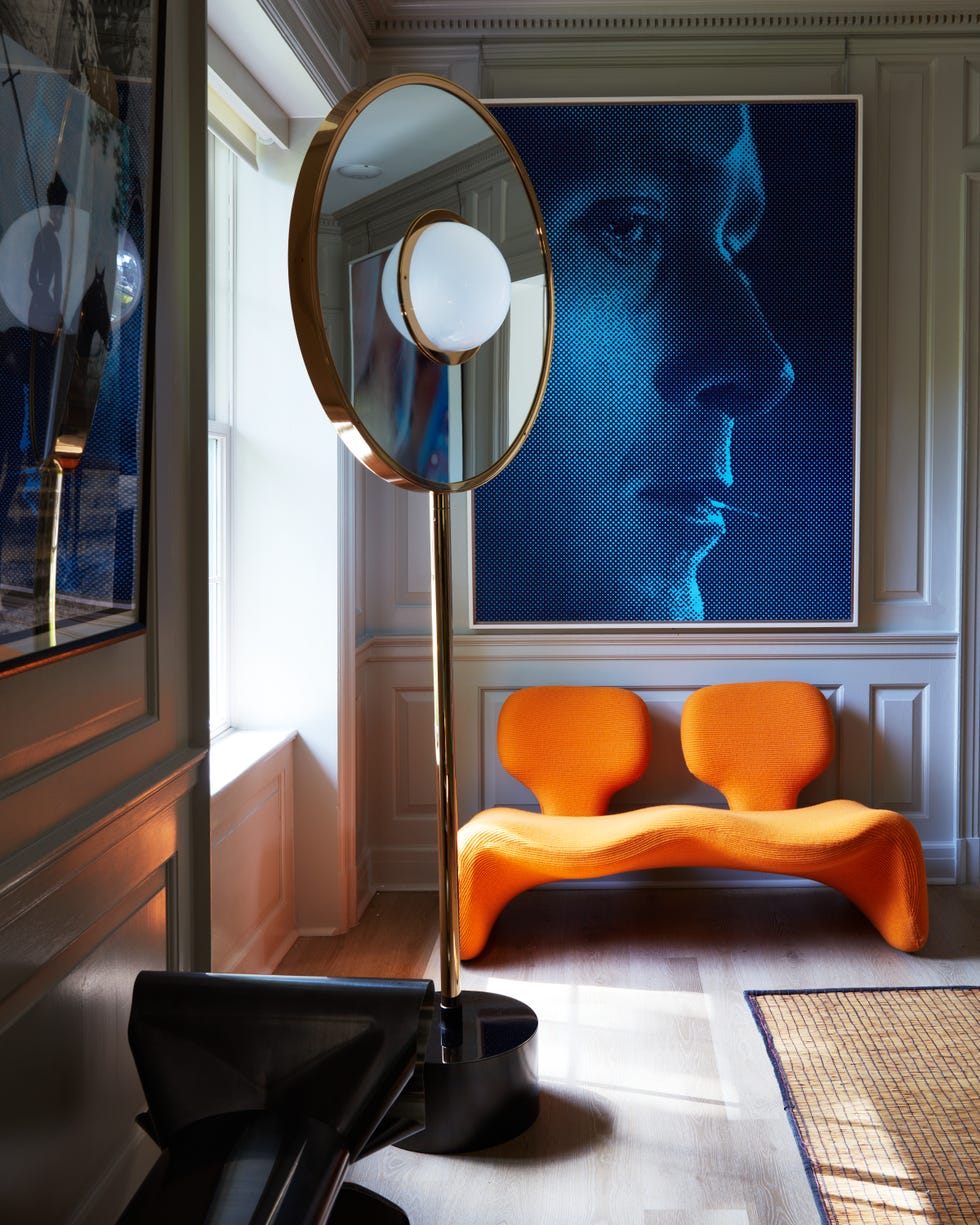 modern interior setting featuring unique furniture and artwork
