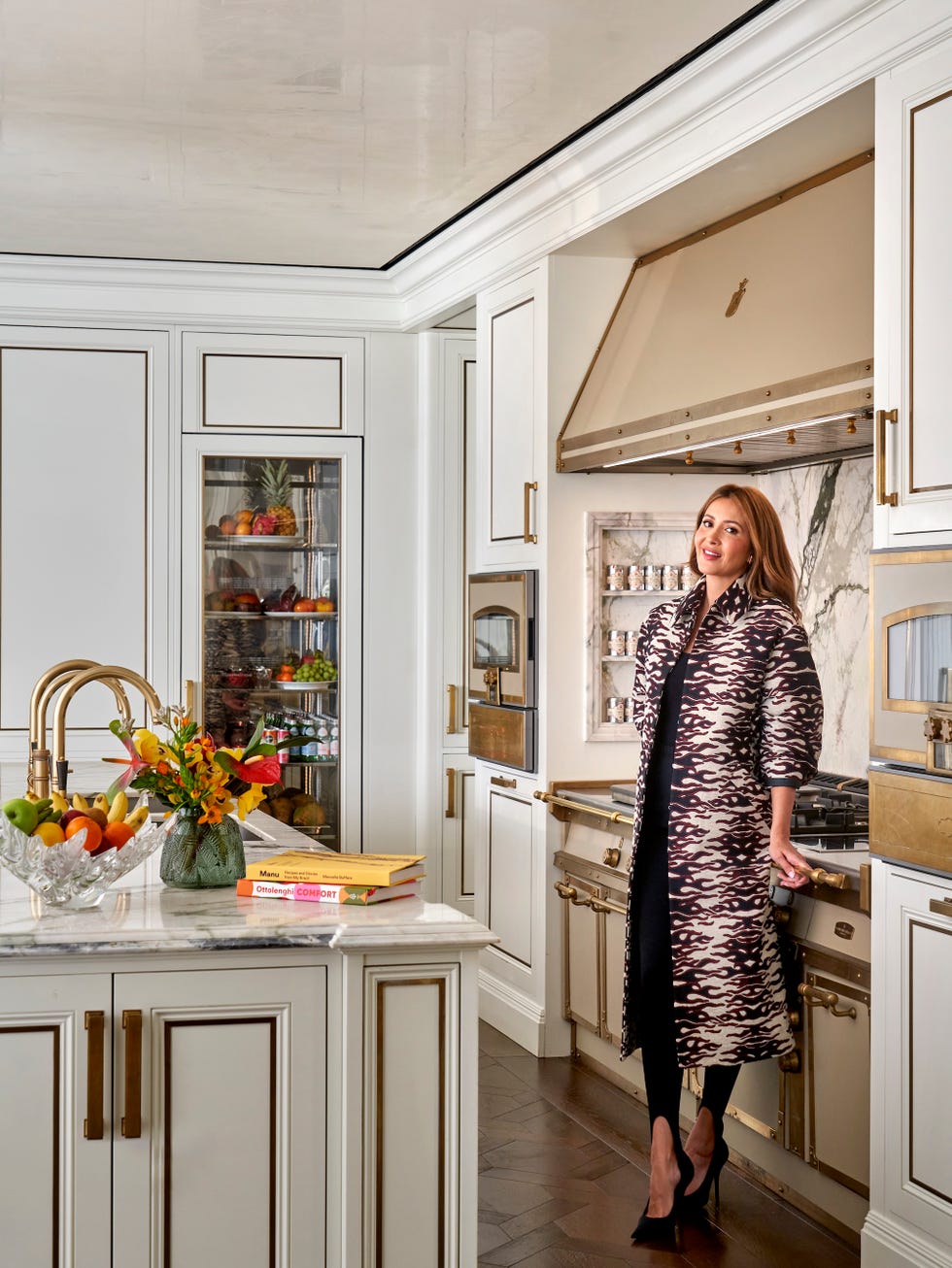 patricia caring in her kitchen, wearing jacquard coat