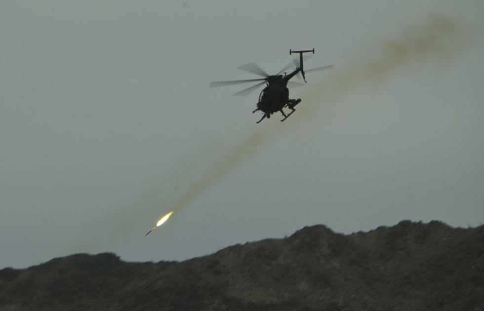 a us army ah 6 little bird in support of marine aviation weapons and tactics squadron one mawts 1 fires rockets at designated targets during an evolution at mt barrow, chocolate mountain aerial gunnery range, calif, april 7, 2016 the evolution was part of weapons and tactics instructor wti course 2 16, a seven week training event hosted mawts 1 cadre mawts 1 provides standardized advanced tactical training and certification of unit instructor qualifications to support marine aviation training and readiness and assists in developing and employing aviation weapons and tactics us marine corps photo by cpl summer s dowding, mawts 1 comcam released