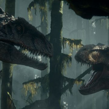 from left a giganotosaurus and t rex in jurassic world dominion, co written and directed by colin trevorrow