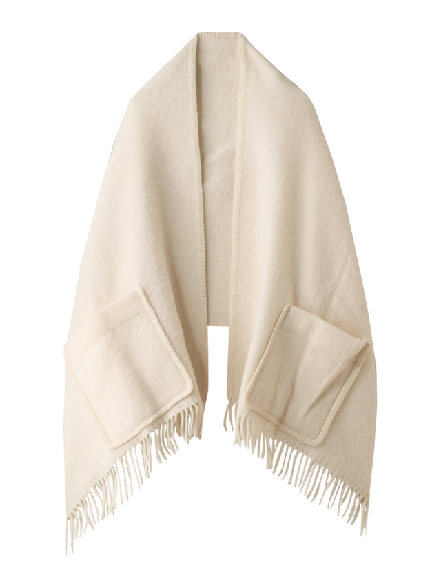 a white and brown folded white towel