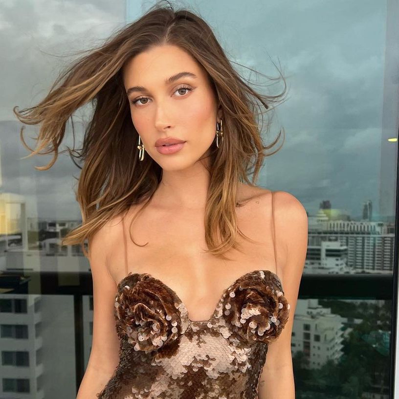 Magda Butrym - Hailey Bieber in flower bustier sequin midi dress from  Spring Summer 2022 Collection 👸 Styled by Karla Welch Discover more  bit.ly/3HsfnuS