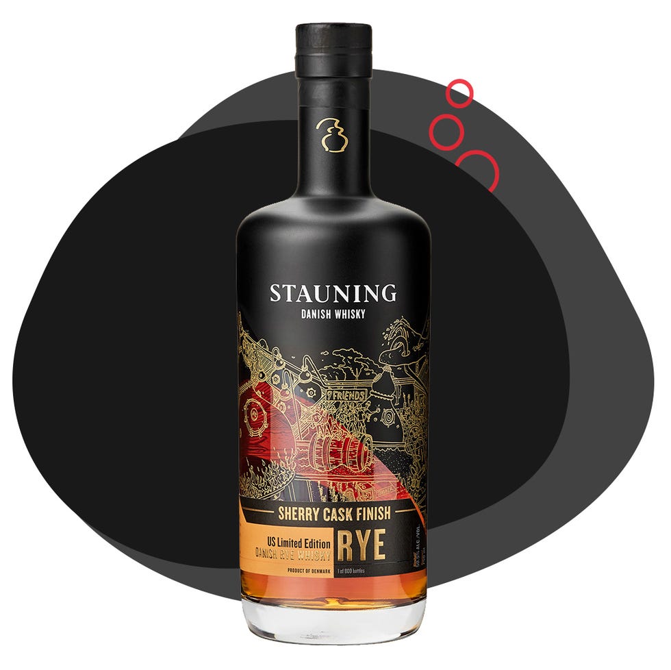 bottle of stauning danish whisky with a black and gold design