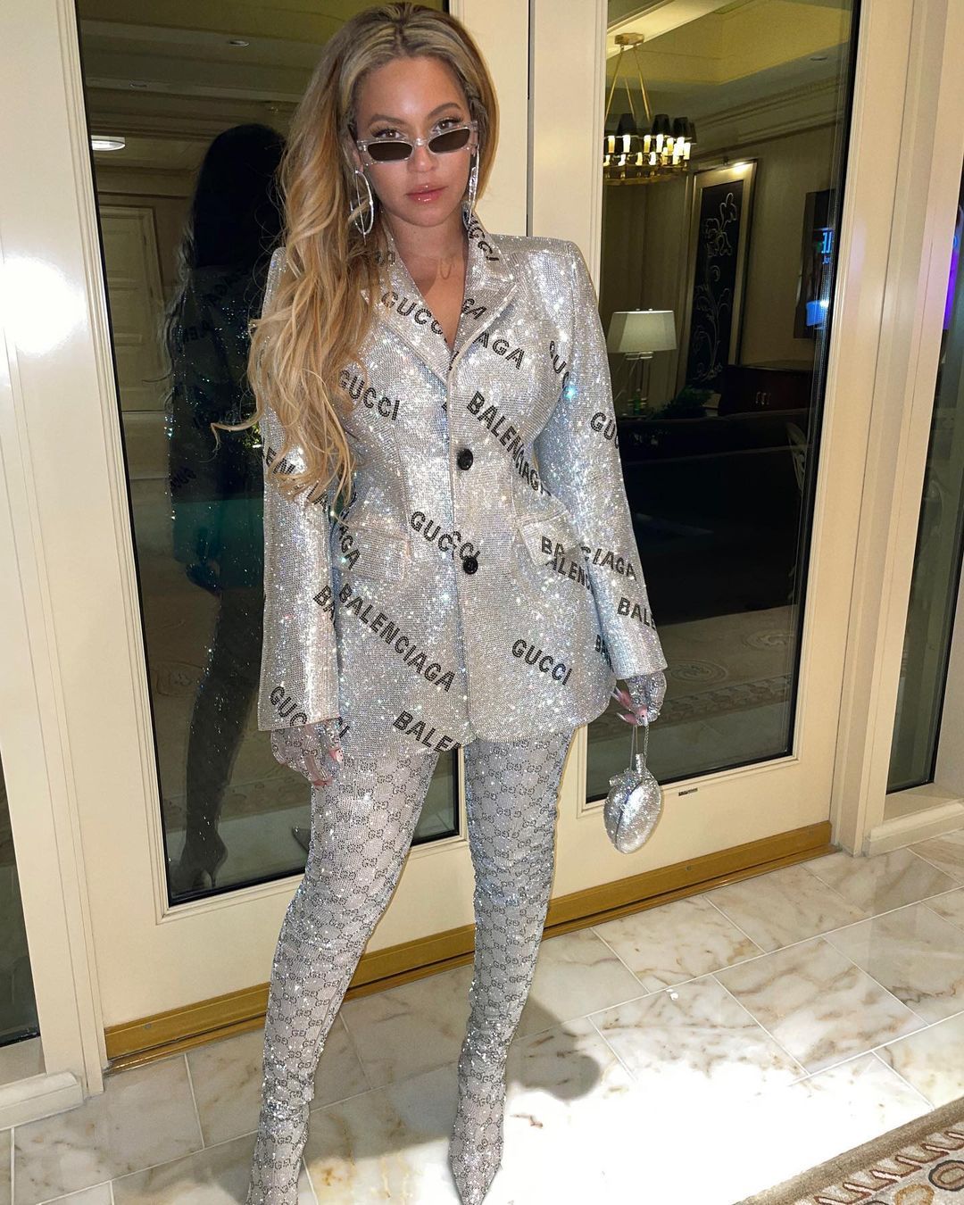 Beyoncé Wears a Silver Jacket and Skirt For the Louis Vuitton Party