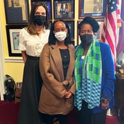 This is an image angelina jolie, zahara, and politician sheila jackson lee pose for photo in office