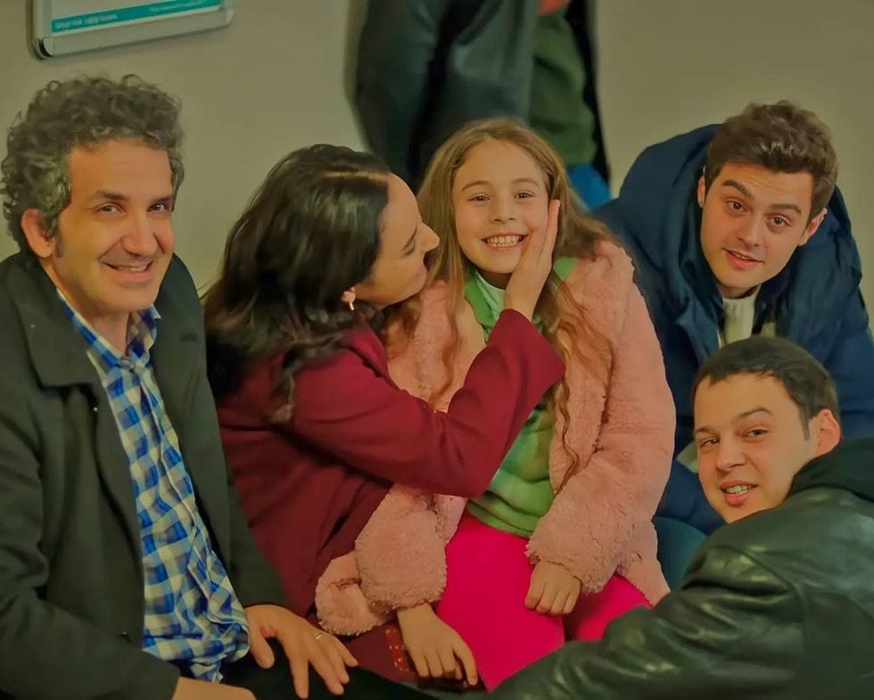 a group of people posing for a photo