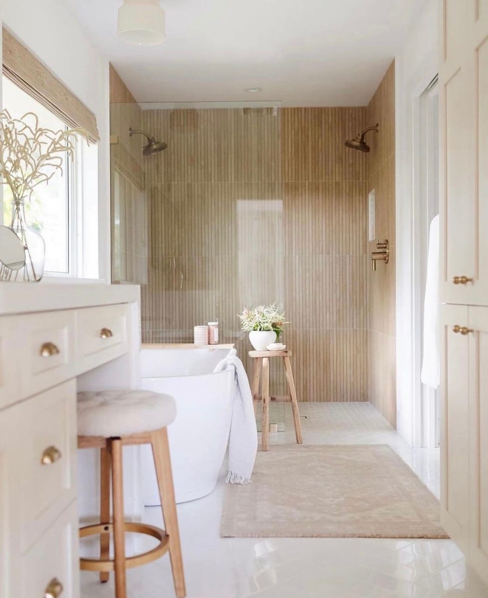 a bathroom with porcelain tile from the tile bar, good housekeeping's pick for best design consultancy