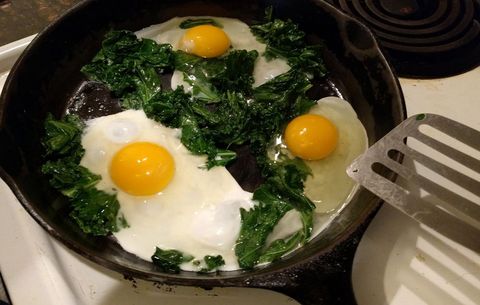 eggs and kale in skillet