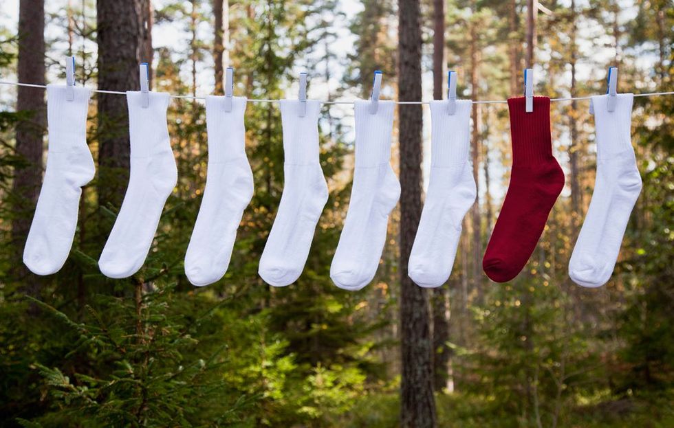socks hanging on clothes line