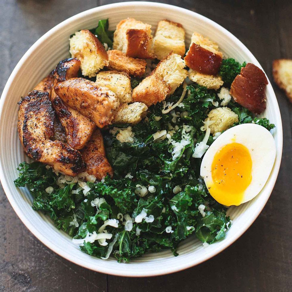 kale salad with chicken and soft boiled eggs