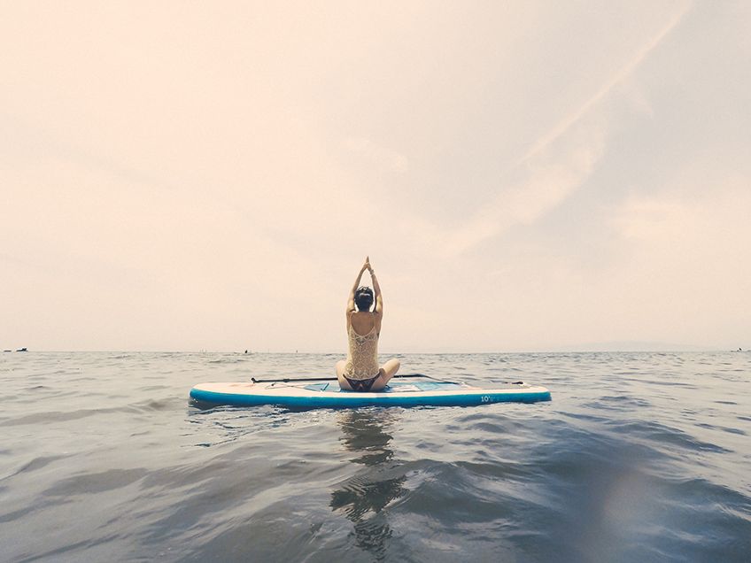 What to Expect at Your First Paddleboard Yoga Class