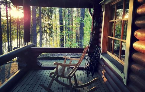 Rocking chair on cabin front porch