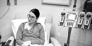 clea shearer looking somber sitting in hospital bed at their first day of chemo