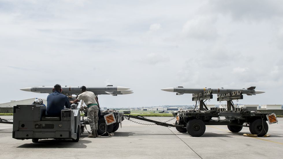 maintainers from the 18th aircraft maintenance squadron and pilots assigned to the 44th and 67th fighter squadrons conduct a mass aircraft generation exercise aug 22 and 23, at kadena air base, japan maintainers loaded aim 9 sidewinder missiles, aim 120 advanced medium range air to air missiles, flares, and m 61a1 cannon rounds onto f 15 eagles, before the aircraft taxied and were dispersed around the flight line kadena participates in a variety of routine training exercises throughout the year to maintain a consistent high standard of readiness and expertise f 15s assigned to kadena air base taxied on the flight line during a training exercise aug 23 while loaded with live ammunition this training was not in response to or in anticipation of any regional concerns while no planes took off from the flightline, this routine exercise helped ensure kadena’s ability to provide air superiority in the defense of japan and promoting peace and stability throughout the indo asia pacific region us air force photo by senior airman peter reftreleased