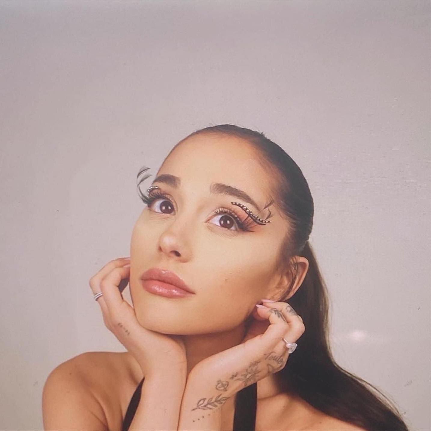 Ariana Grande Unveils '70s-Inspired Curtain Bangs On Instagram