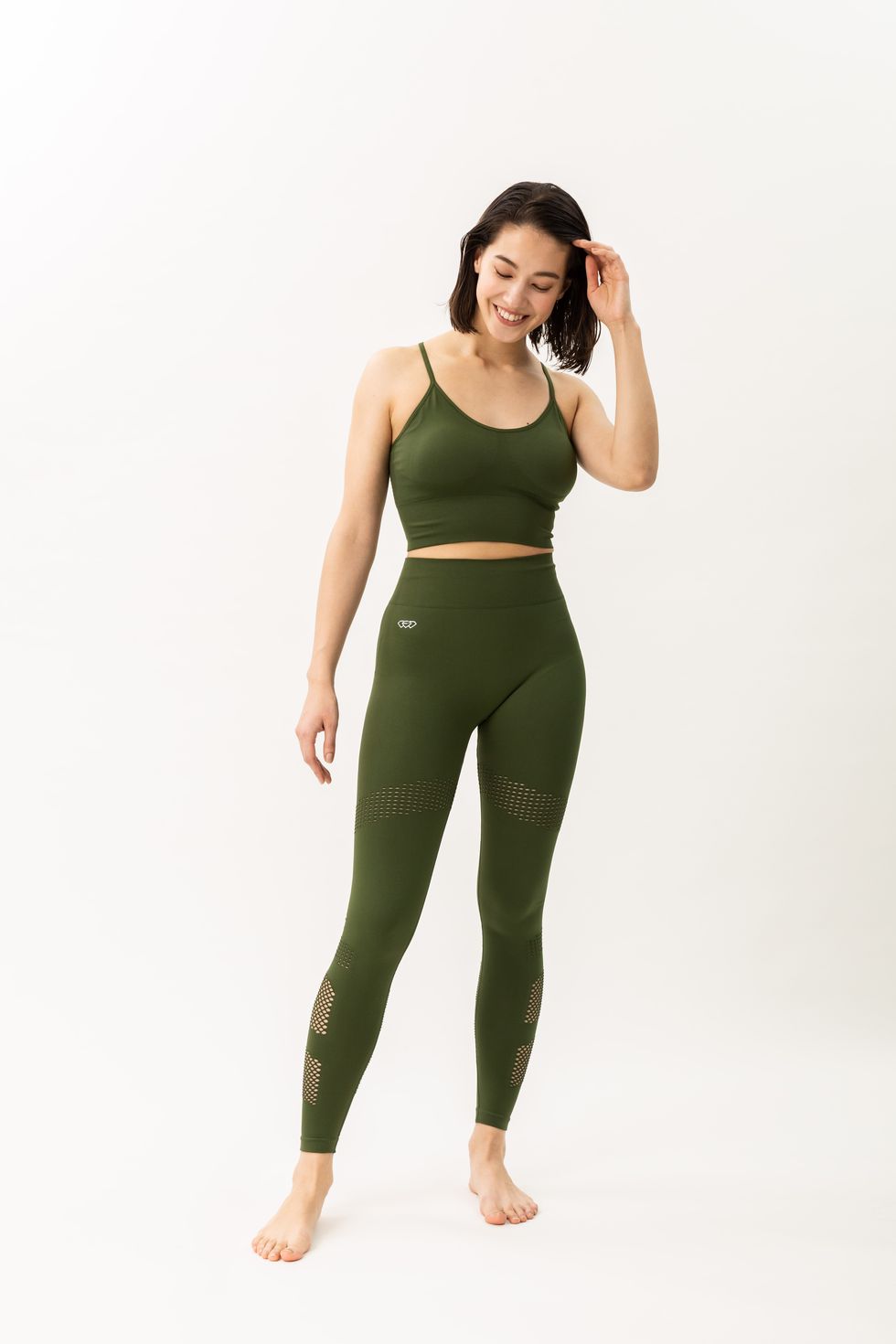 Clothing, Green, Shoulder, Sportswear, Standing, Waist, Arm, Tights, Leggings, Joint, 