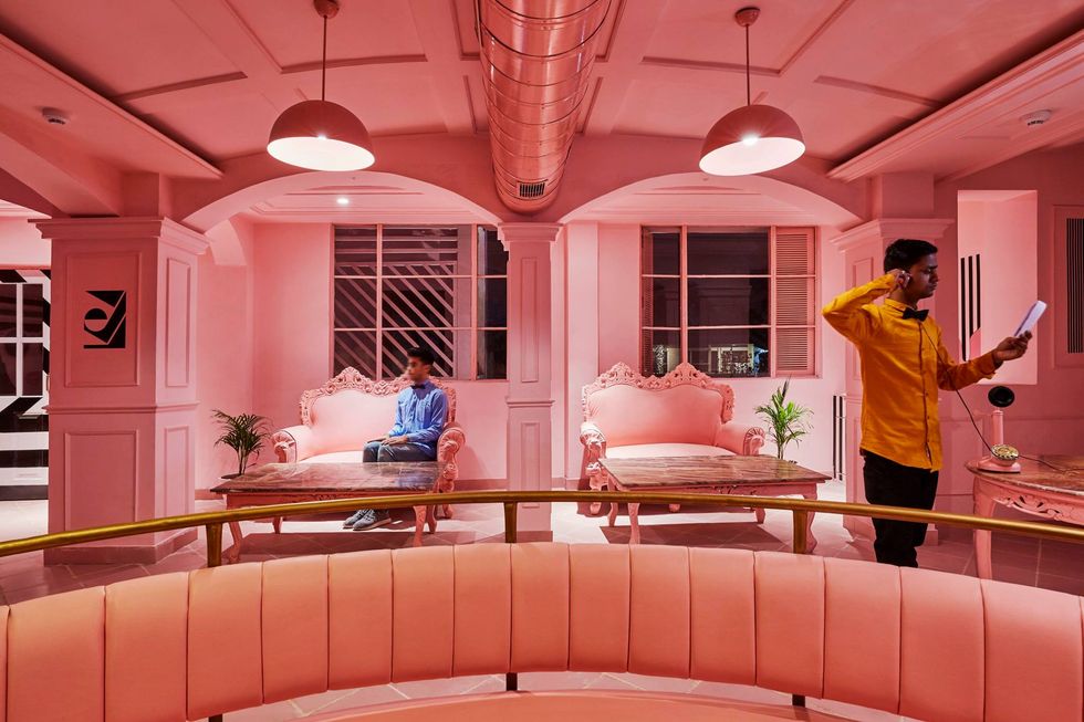 Ceiling, Interior design, Room, Pink, Lighting, Building, Furniture, Architecture, Peach, Table, 