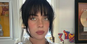 billie eilish looking at the camera with bangs
