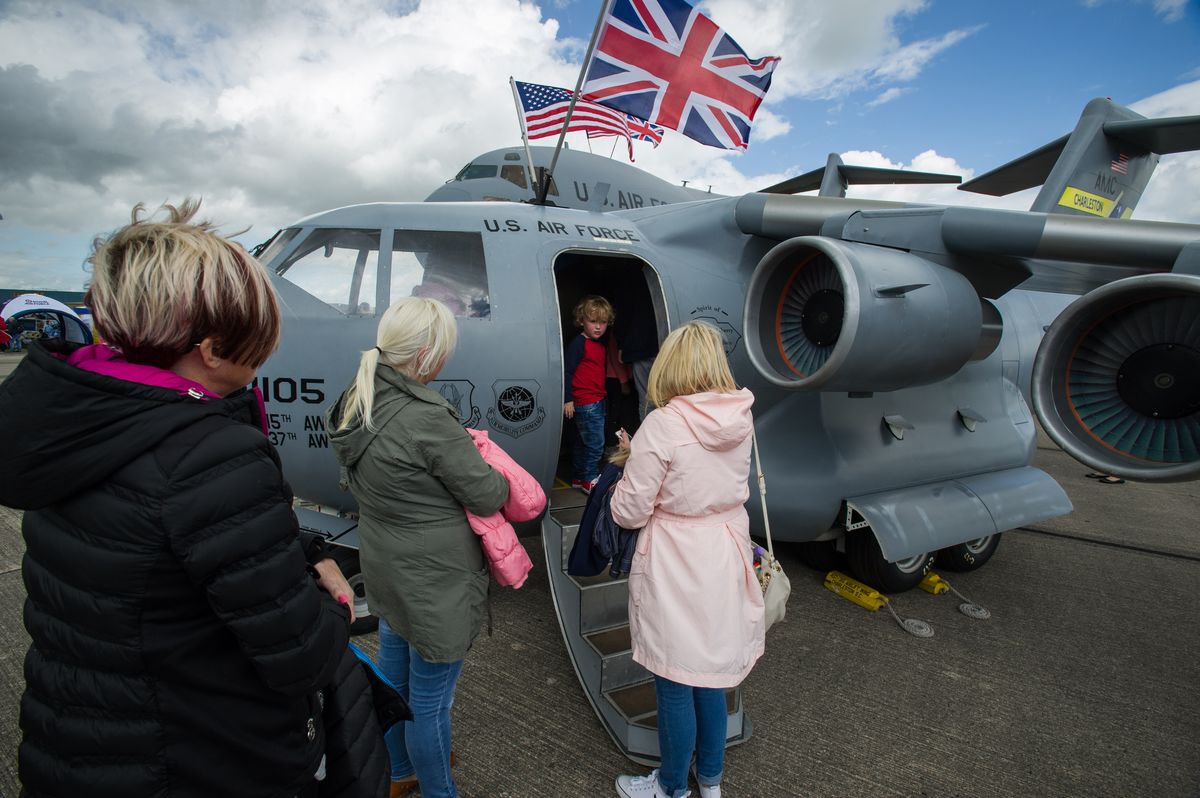 attendees of the yeovilton, england crowd around the 315th airift wing's mini c 17 and a charleston c 17 globemaster iii july 2 this was the mini c 17's first trip across the pond and was a huge hit at yeovilton air day 2016 this is the 315th aws second time visiting royal naval air station yeovilton, england, and the mighty presence of the mini c 17 helped seal the deal for another “best static display” award the miniature c 17 has been used all across the united states to promote the air force reserve and bolster recruiting efforts at air shows, parades and other community events us air force photo by master sgt shane ellis