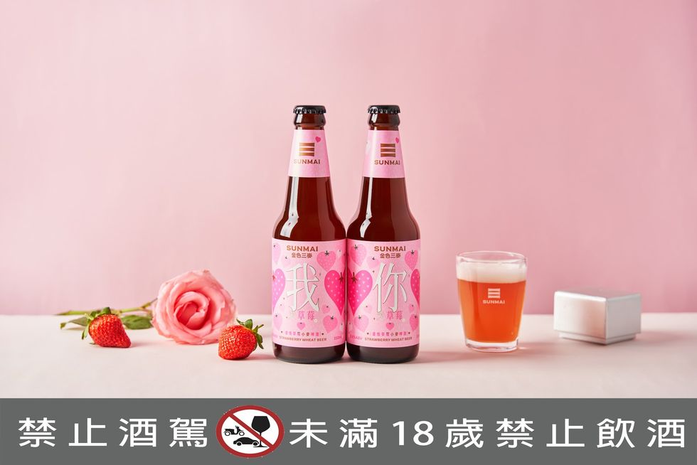 粉色酒標的啤酒罐