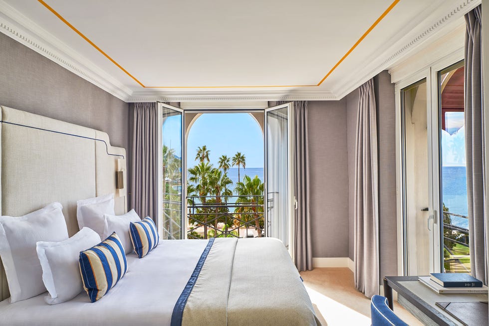 Bright hotel room with ocean view and modern decor