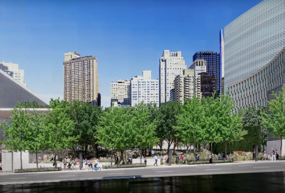 Urban park scene with people enjoying green space surrounded by buildings.