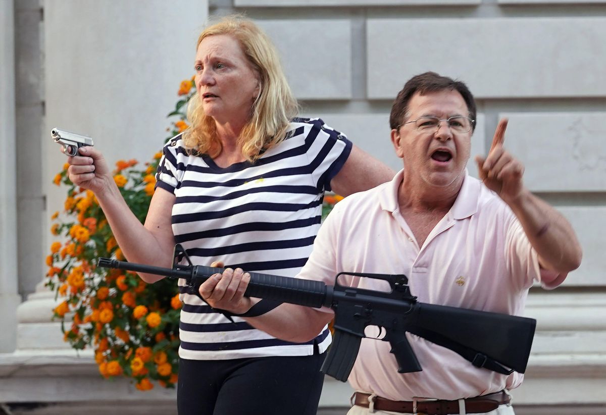 patricia mccloskey and husband mark, shown aiming their guns at black lives matter protesters in st louis in june 2020