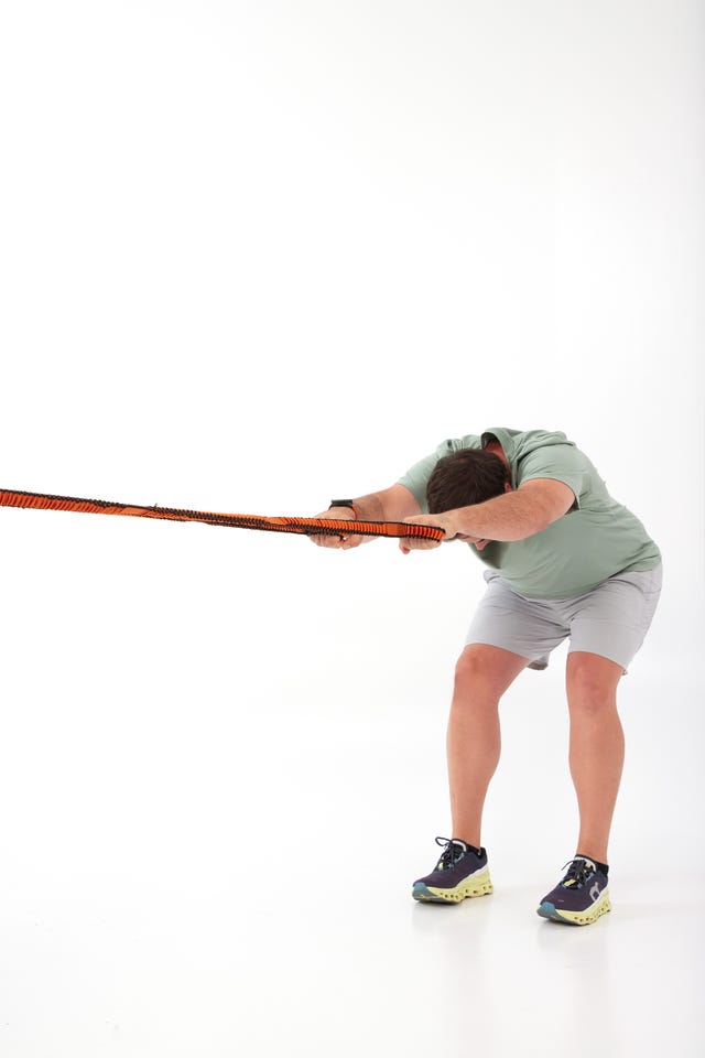 a man holding a bow and arrow