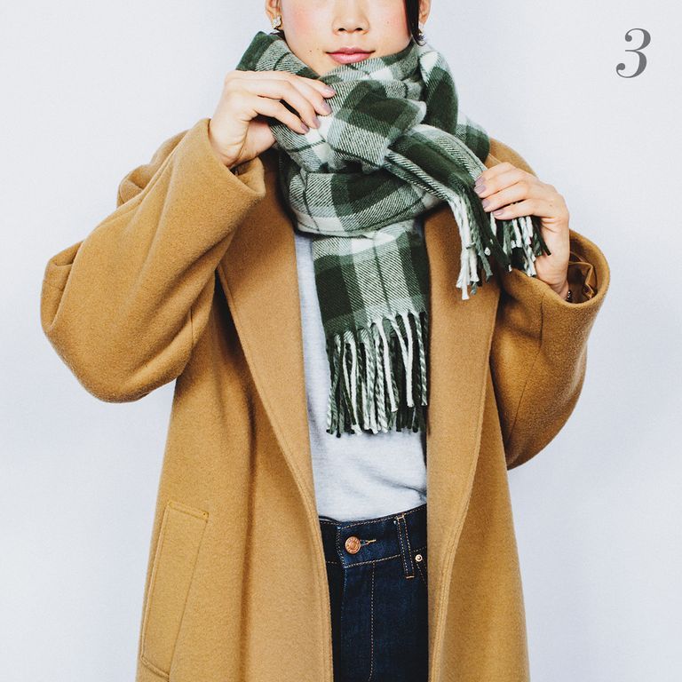 Clothing, Scarf, Stole, Outerwear, Overcoat, Fashion accessory, Shawl, Font, Neck, Beige, 