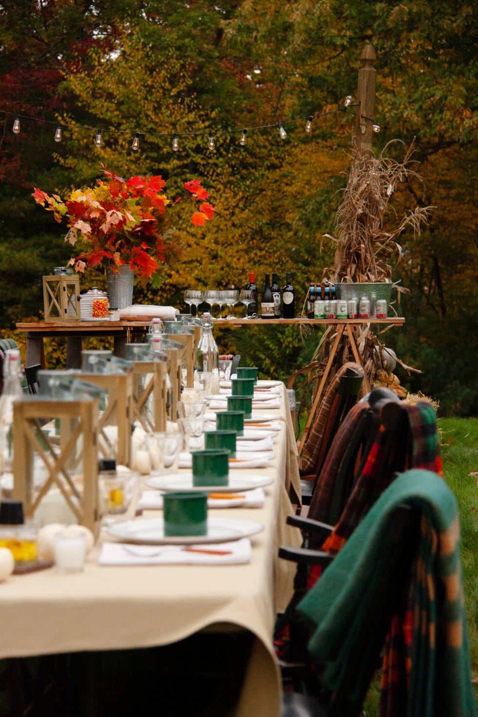 a set outdoor table with a bar at the far end