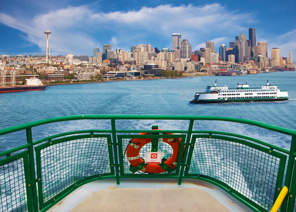 downtown seattle skyline from the back of ferry boat