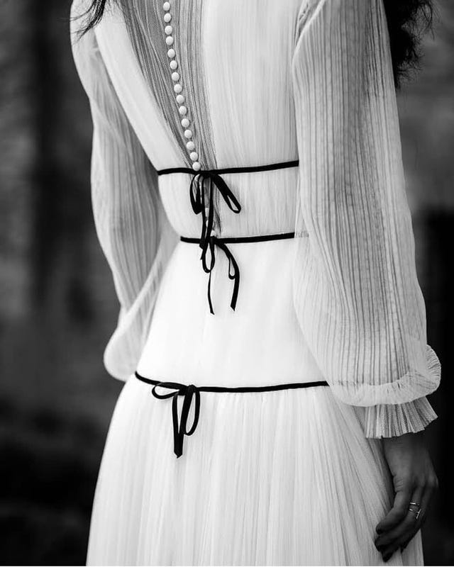 White, Black, Shoulder, Black-and-white, Waist, Monochrome photography, Joint, Dress, Neck, Outerwear, 