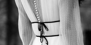 White, Black, Shoulder, Black-and-white, Waist, Monochrome photography, Joint, Dress, Neck, Outerwear, 