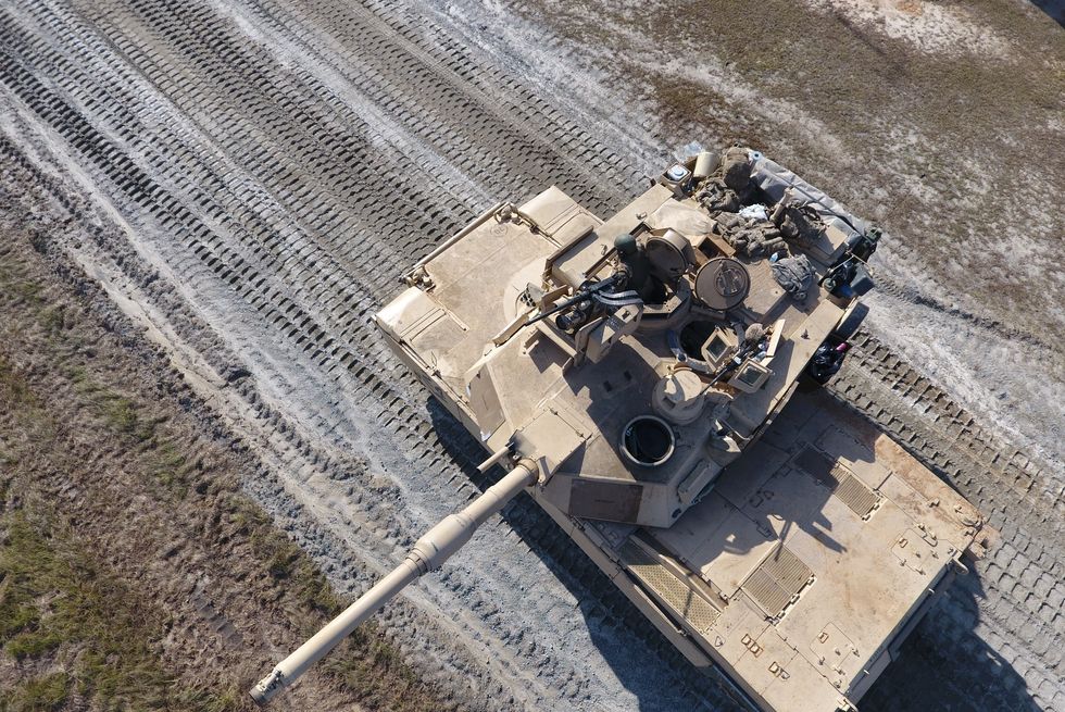 aerial drone image of an m1a2 abrams main battle tank crew, from the 1st armor brigade combat team, 3rd infantry division, conducting table vi gunnery at fort stewart, ga december 8, 2016