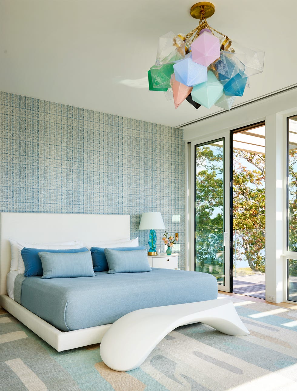 bedroom with wavy white moulded plastic bench