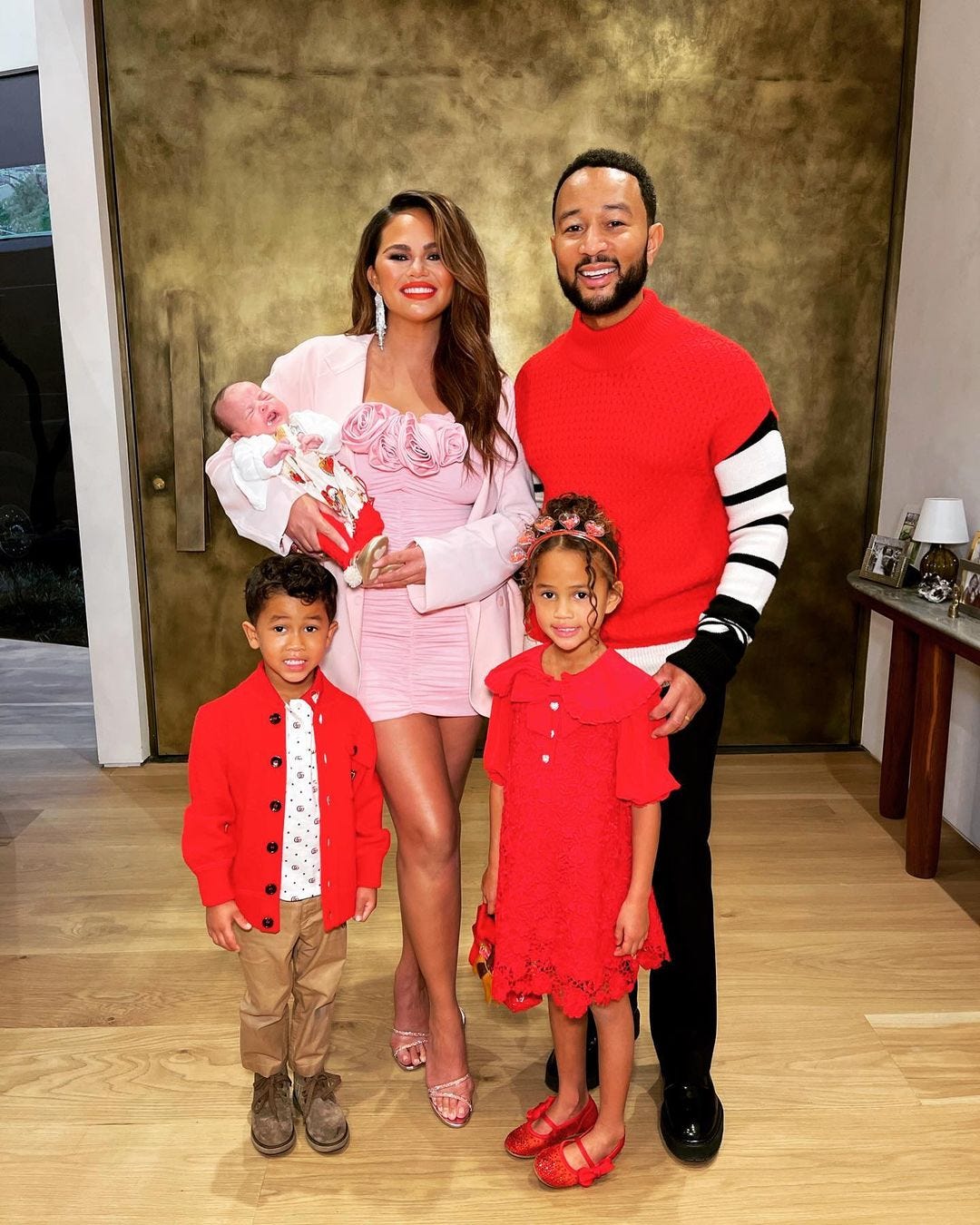 John Legend Wears Pink, Gives Chrissy Teigen a Kiss on Her Bday