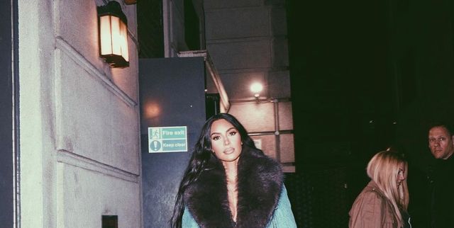 Kim Kardashian Wore a Gigantic Pink Faux Fur Coat While Playfully