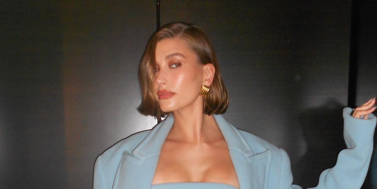 Hailey Bieber Poses in a Shower Wearing Nothing But a Leather Jacket, Tank Top, and a Thong