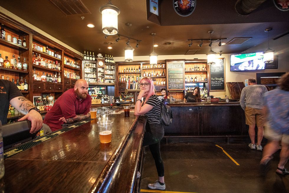 at fillmore pub, general manager erik padilla talks with jenny puma downtown plano texas has mostly opened back up by may 8th restaurants must be at 25 capacity or lesssome retail stores are open by appointmentmay 8, 2020photos by misty keaslerredux