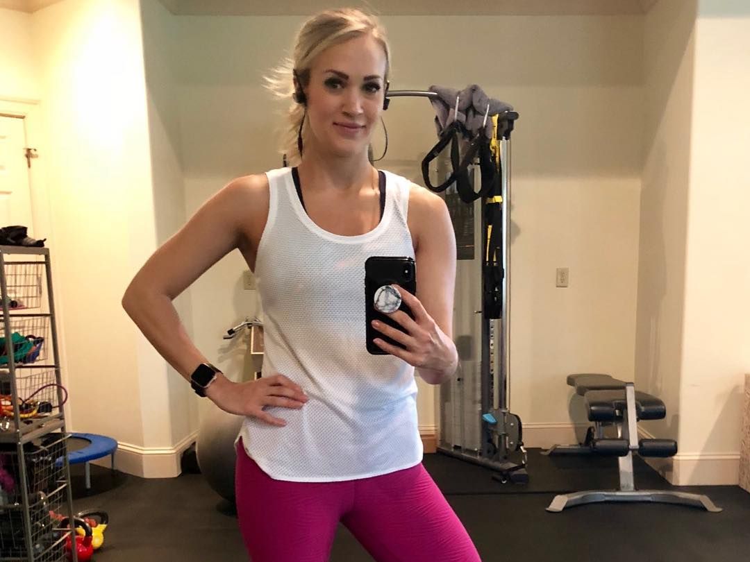 Carrie Underwood Says Wearing Cute Workout Clothes Gives Her a Boost at the  Gym