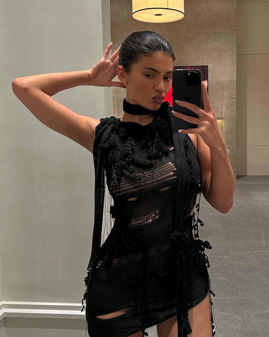 Kylie Jenner Does Spring in a Little Black Knit Dress with Cutouts