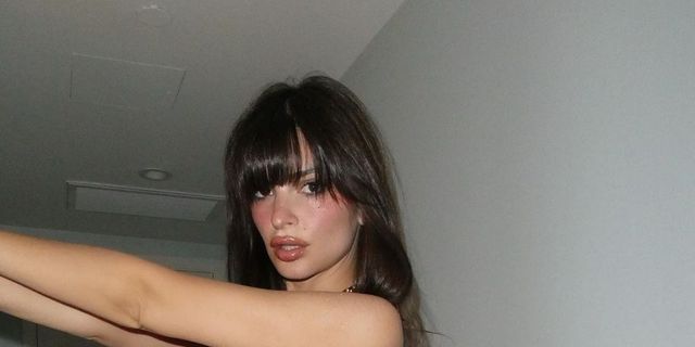 Emily Ratajkowski Does the Exposed Thong Trend in Biker Shorts