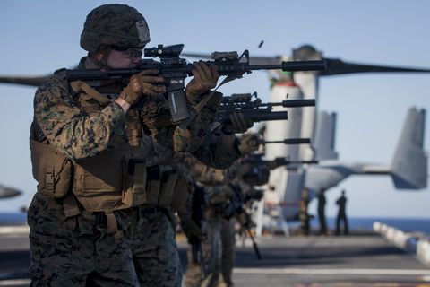 cpl devan reaves, a gunner with weapons company, battalion landing team, 3rd battalion, 5th marines, 31st marine expeditionary unit, fires an m4a1 carbine augmented with a kac qd suppressor during marksmanship training aboard the uss bonhomme richard lhd 6 while underway in the pacific ocean, july 4, 2017 blt 35 is currently deployed as the ground combat element for the 31st meu and is exploring state of the art concepts and technologies as the dedicated force for sea dragon 2025, a marine corps initiative to prepare for future battles the 31st meu partners with the navy’s amphibious squadron 11 to form the amphibious component of the bonhomme richard expeditionary strike group the 31st meu and phibron 11 combine to provide a cohesive blue green team capable of accomplishing a variety of missions across the indo asia pacific region us marine corps photo by lance cpl stormy mendezreleasedus marine corps photo by lance cpl stormy mendez released