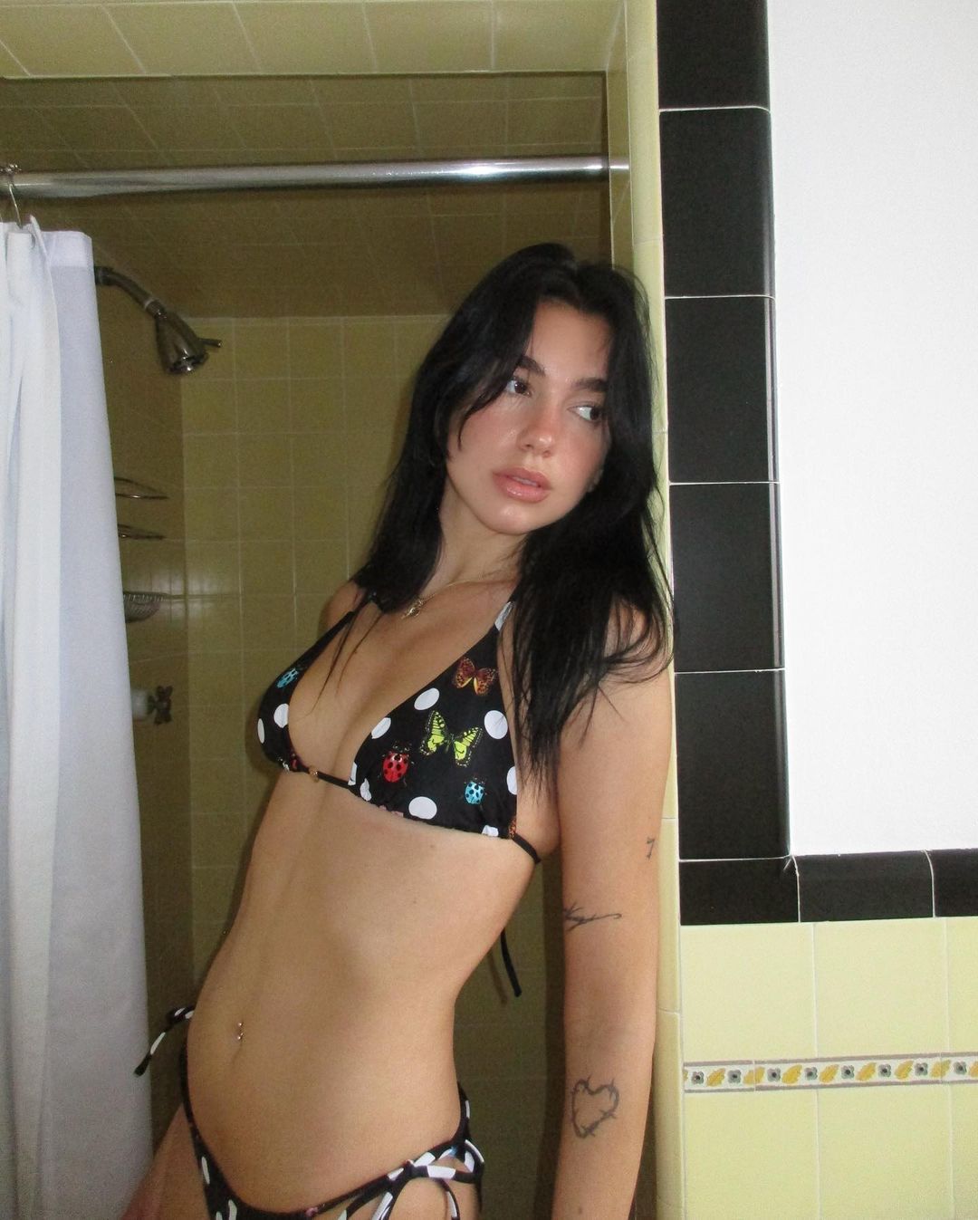 Dua Lipa Welcomes the Start of Bikini Season in an Itty-Bitty Polka-Dot Set