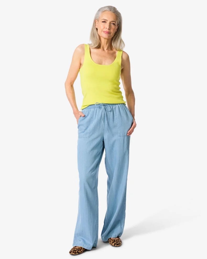 A model poses in an airy HEMA outfit