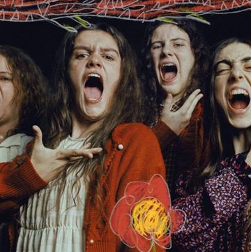 a group of women with their mouths open