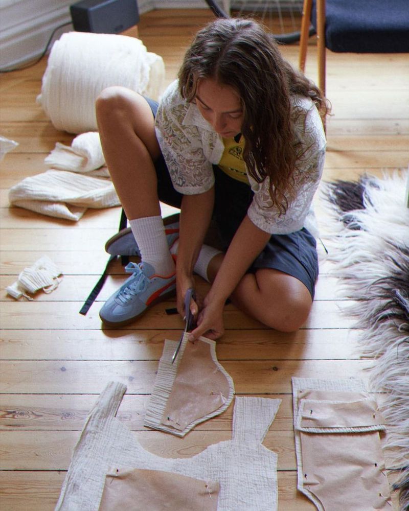 a girl with a brush on the floor