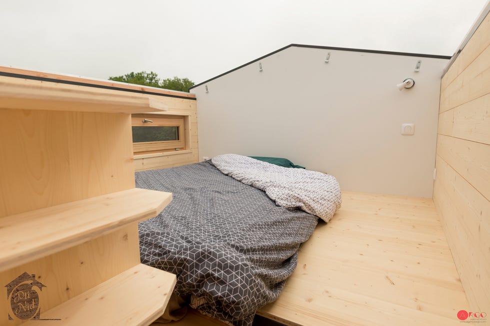 Mini casa con techo retráctil