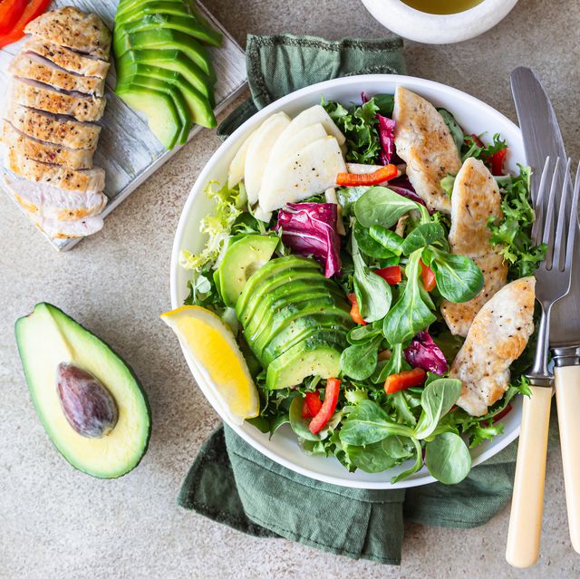 grilled chicken and fresh vegetable salad of tomato, avocado, lettuce and spinach